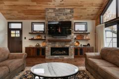 Kochmann Brothers Homes custom luxury lake home living room with fireplace