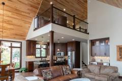 Kochmann Brothers Homes custom luxury lake home living room with balcony