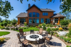 Kochmann Brothers Homes custom luxury lake home patio fire ring