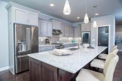 Kochmann Brothers Homes custom luxury kitchen  - photo by Area Women Magazine in Fargo