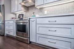 Kochmann Brothers Homes custom luxury kitchen range area  - photo by Area Women Magazine in Fargo