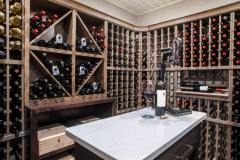 Kochmann Brothers Homes custom luxury wine cellar - photo by Area Women Magazine in Fargo