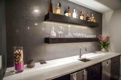 Kochmann Brothers Homes custom luxury bar area - photo by Area Women Magazine in Fargo
