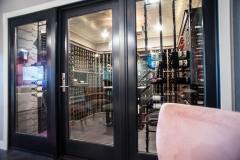 Kochmann Brothers Homes custom luxury wine cellar - photo by Area Women Magazine in Fargo